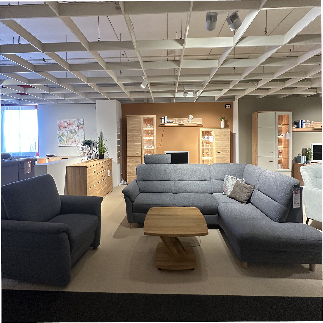 Wohnlandschaft in Rauchblau mit Schlaffunktion, Bettkasten & Sessel