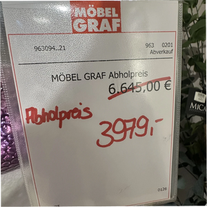 Moderne Wohnwand in Weiß mit beleuchteten Glasvitrinen – Abverkauf-Ausstellungsstück