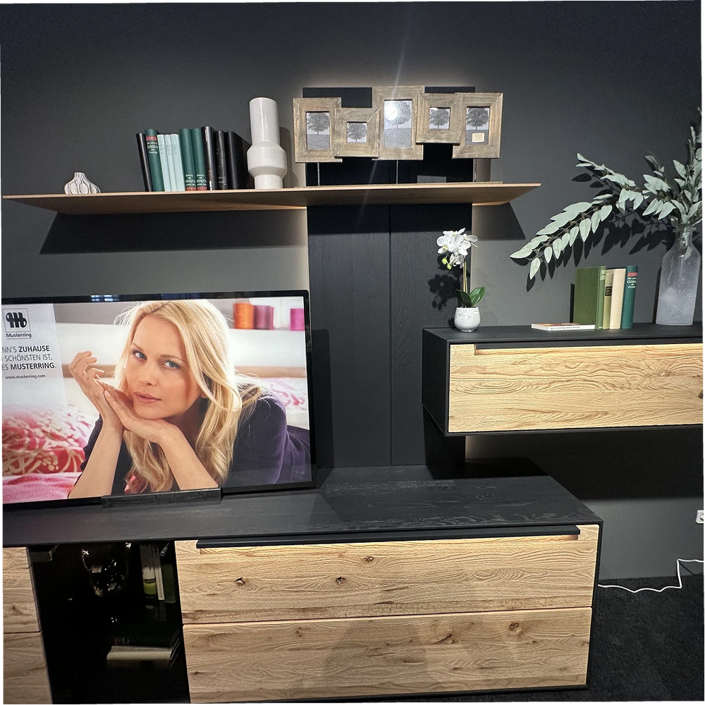 Wohnwand Musterring – Schwarz & Eiche natur mit Wandboard, Hängeelement & TV-Lowboard