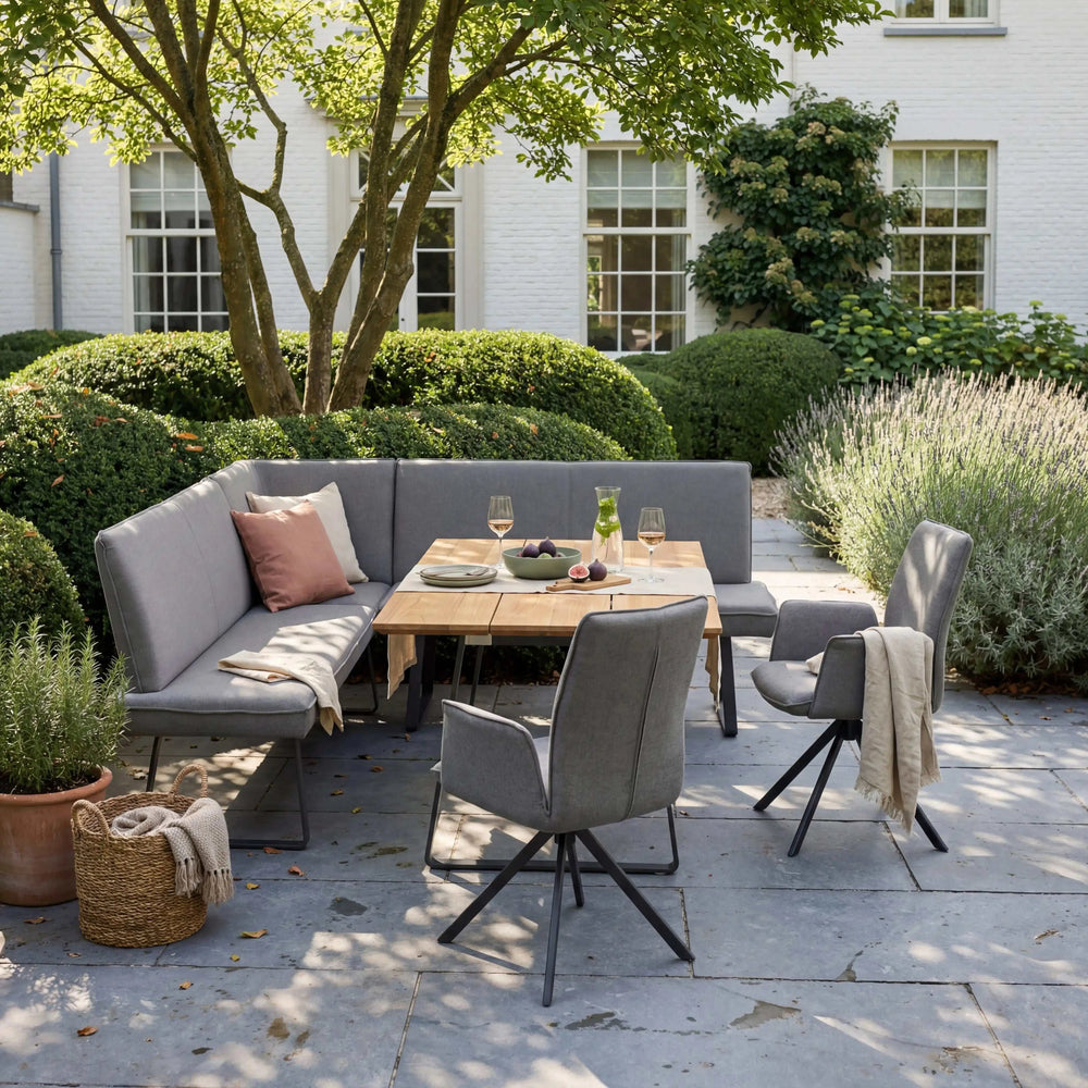 Moderne Eckbankgruppe Elba mit pulverbeschichtetem Stahlgestell und Olefin-Bezug in Grau auf Terrasse