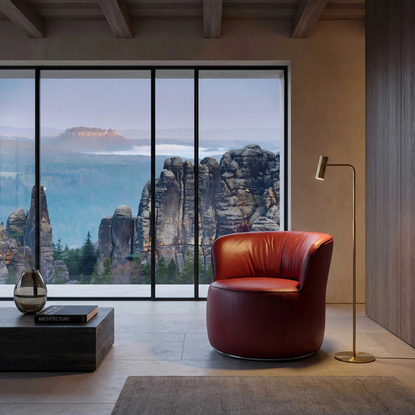 Sessel Igor aus schwarzem Leder A-India Omega mit hochglänzendem M-Drehring aus Metall