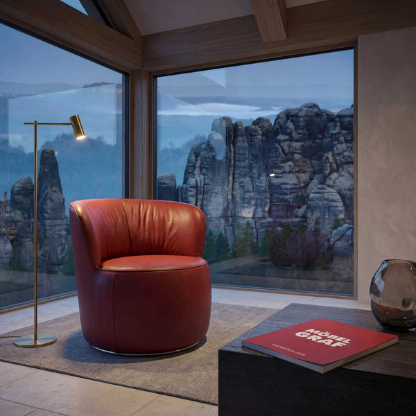 Schwarzer Sessel Igor aus Leder A-India Omega mit Hochglanz-Metall-Drehring