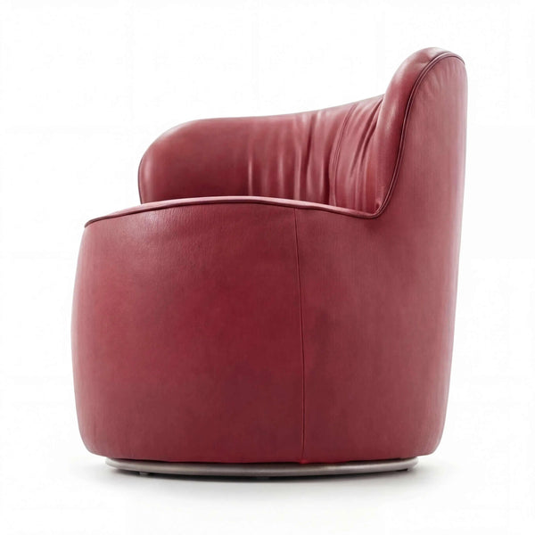 Sessel Igor aus schwarz gemasertem Leder mit hochglanz schwarzem Metall-Drehring