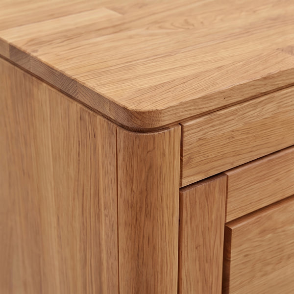 Sideboard 25005 – Eiche vollmassiv mit durchgehender Lamellen-Front