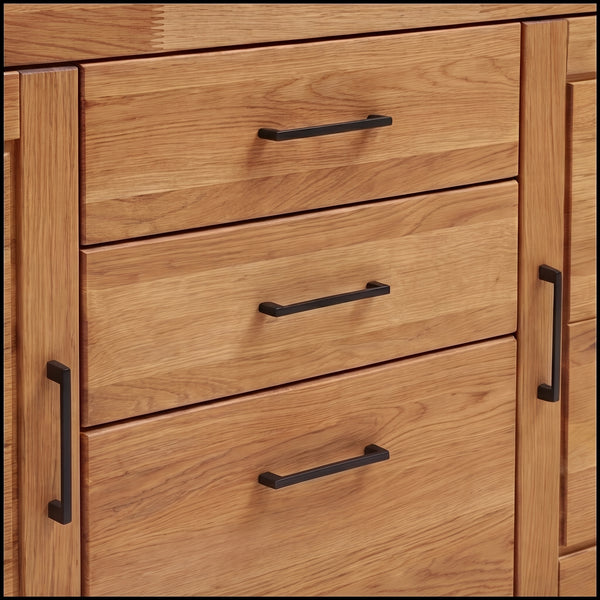 Sideboard 25005 – Eiche vollmassiv mit durchgehender Lamellen-Front